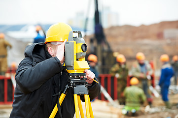 Image showing surveyor works with theodolite
