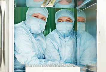 Image showing Two pharmaceutical factory workers