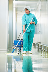 Image showing Woman cleaning hospital hall