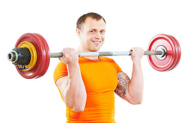 Image showing bodybuilder man doing exercises with weight