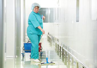 Image showing Woman cleaning hospital hall