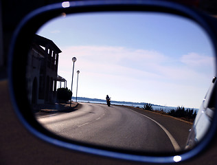 Image showing Curve in a rear view mirror