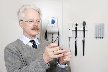 Image showing Doctor Ready To Give Vaccination