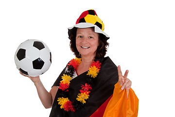 Image showing Female soccer fan with ball