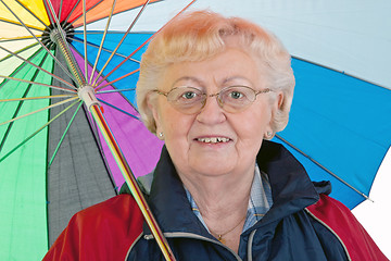 Image showing Elderly woman with umbrella