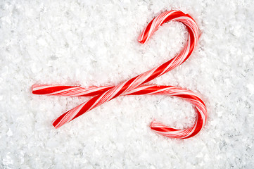 Image showing Candy Canes in snow