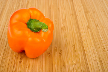 Image showing Orange Bell Pepper on Cutting Board
