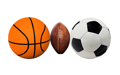 Image showing A group of sports balls on a white