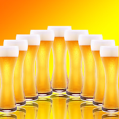 Image showing A row of beer pints