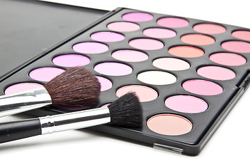 Image showing Makeup brushes and make-up eye shadows