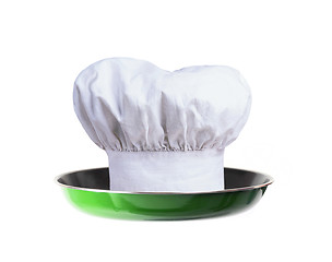 Image showing A professional chefs hat on pan - concept
