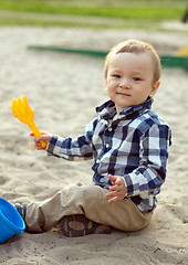 Image showing Child Playing in the Sand