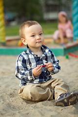 Image showing Child Playing in the Sand