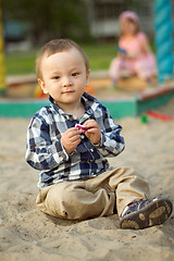 Image showing Child Playing in the Sand