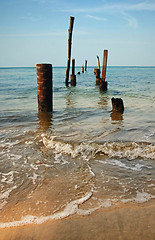 Image showing old jetty pillars in sea