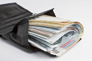 Image showing many banknotes in wallet