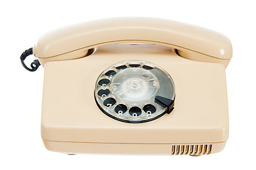 Image showing Old analog phone with a disk, it is isolated on white