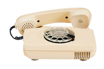 Image showing Old analog phone with a disk, it is isolated on white