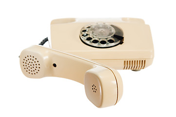 Image showing Old analog phone with a disk, it is isolated on white