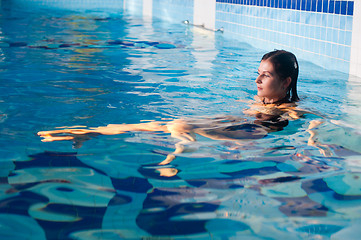 Image showing Attractive girl in swimming pool