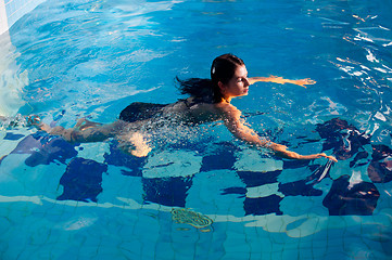 Image showing Attractive girl in swimming pool