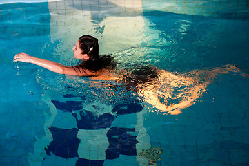 Image showing Attractive girl in swimming pool