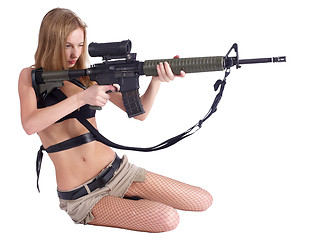 Image showing Pretty woman with rifle