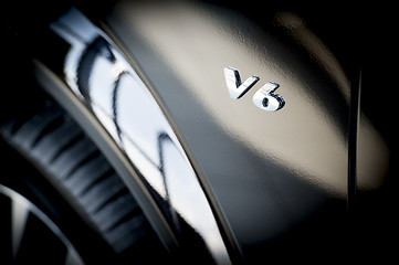 Image showing V6 Emblem on side of new car