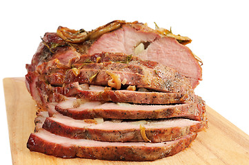 Image showing Roast pork on a wooden board