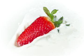 Image showing strawberry splashing into milk