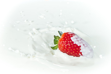 Image showing strawberry splashing into milk