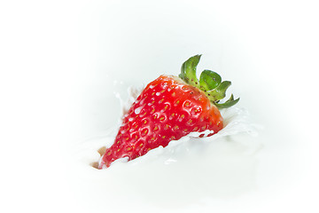 Image showing strawberry splashing into milk