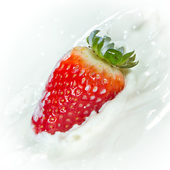 Image showing strawberry splashing into milk