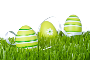 Image showing easter eggs in grass