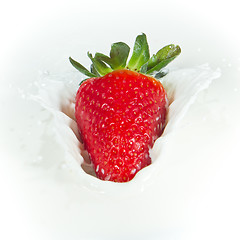 Image showing strawberry splashing into milk