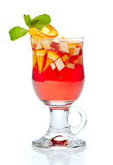 Image showing glass of tea with fresh fruits and syrup