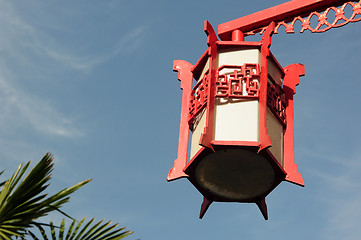 Image showing Red lantern against blue sky