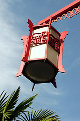 Image showing Red lantern against blue sky