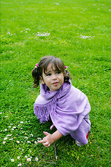 Image showing beautiful girl playing on green grass, summer