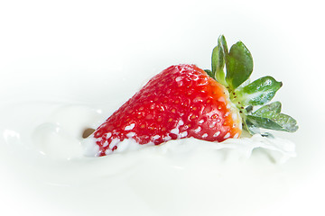 Image showing strawberry splashing into milk