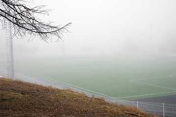 Image showing football field in thick fog in the morning