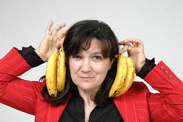Image showing beautiful woman eating banana, healthy food