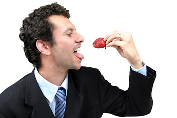 Image showing man with strawberries, healthy food photo