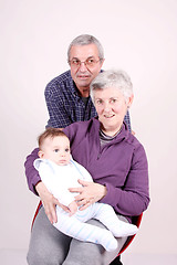 Image showing grandfather, grandmother with baby grandson