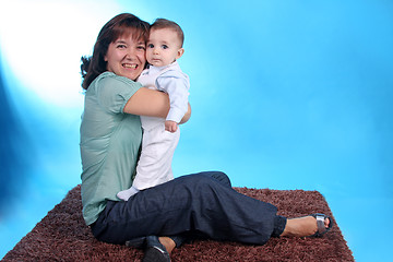 Image showing Portrait of a beautiful happy mother with beautiful baby