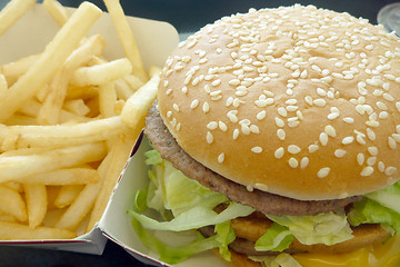 Image showing Tasty hamburger with fries, unhealthy food, health concept