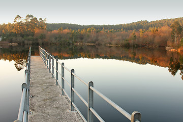 Image showing beautiful autumn landscape with pier, river and reflex, Portugal