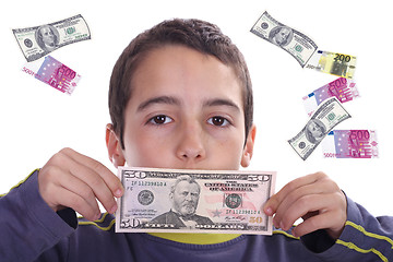 Image showing boy with dolares and euros, business studio photo