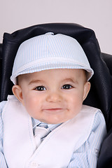 Image showing Portrait of a happy baby boy, studio photo