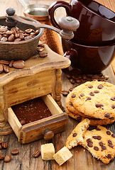 Image showing Coffee Mill, cups and biscuits.